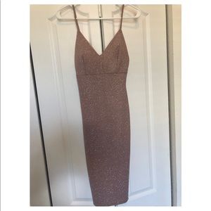 Midi style fitted dress .
